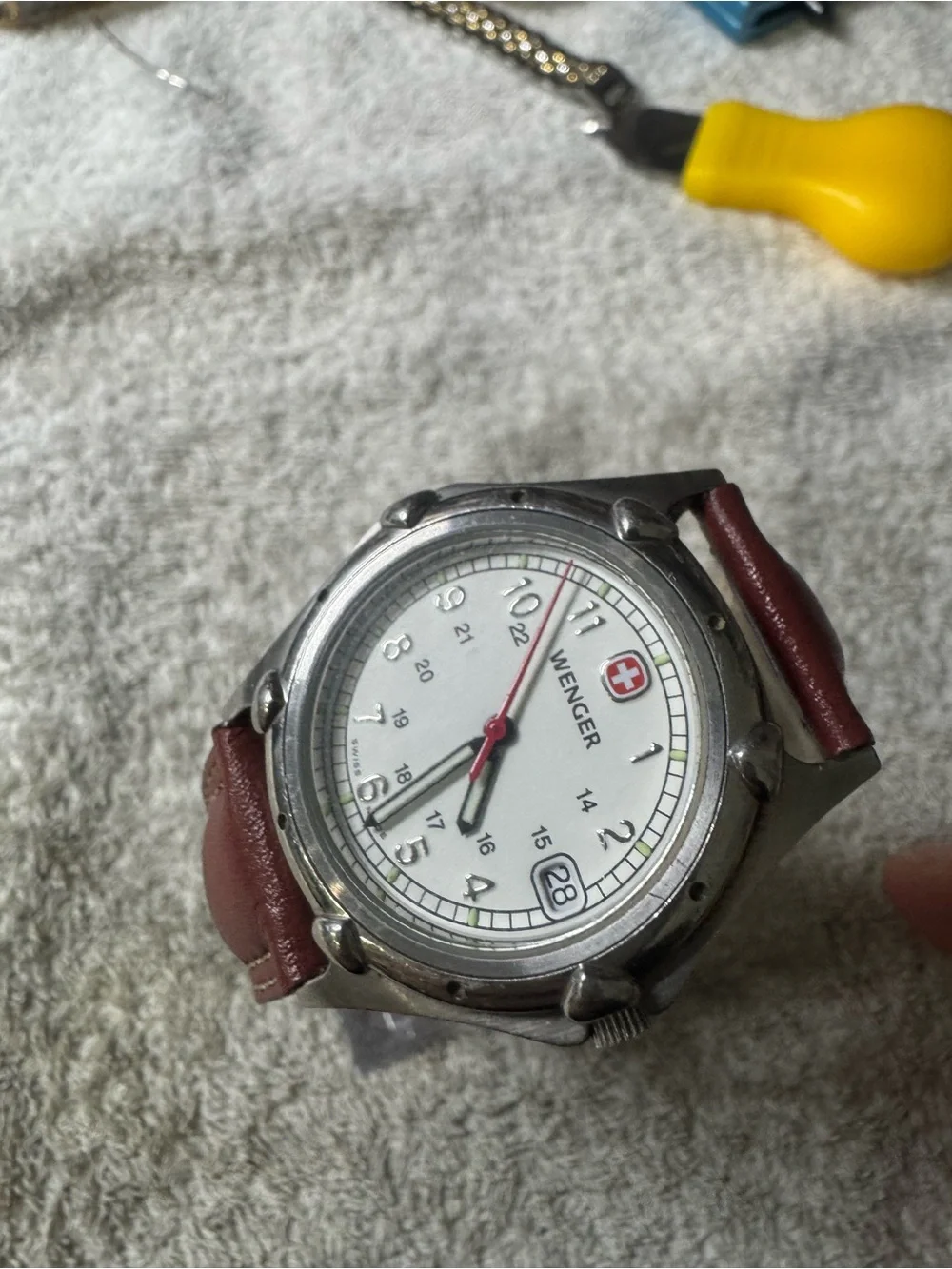 Wenger White Dial Watch with Brown Strap and Red Accent